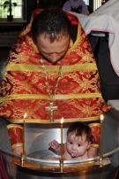 Обряд Крещения младенца в одном из храмов Молдавии